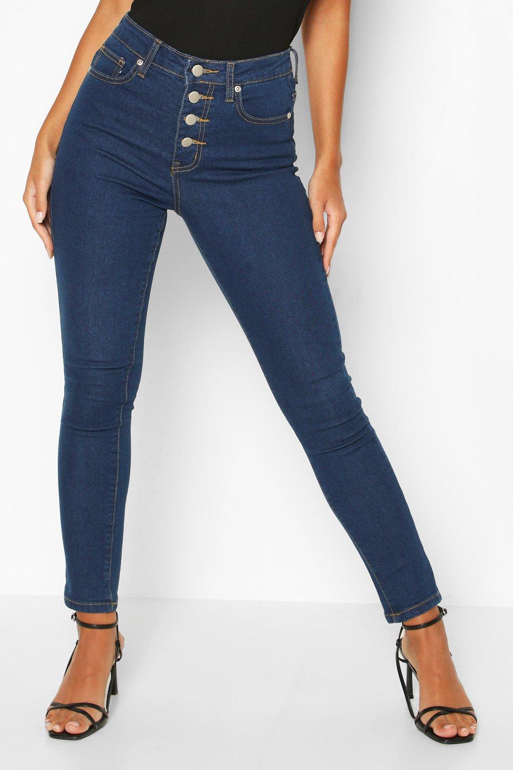 Exposed button store fly skinny jeans